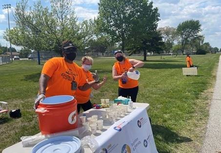 Gary Works’ ERGs Host Water Table at Girls on the Run Event