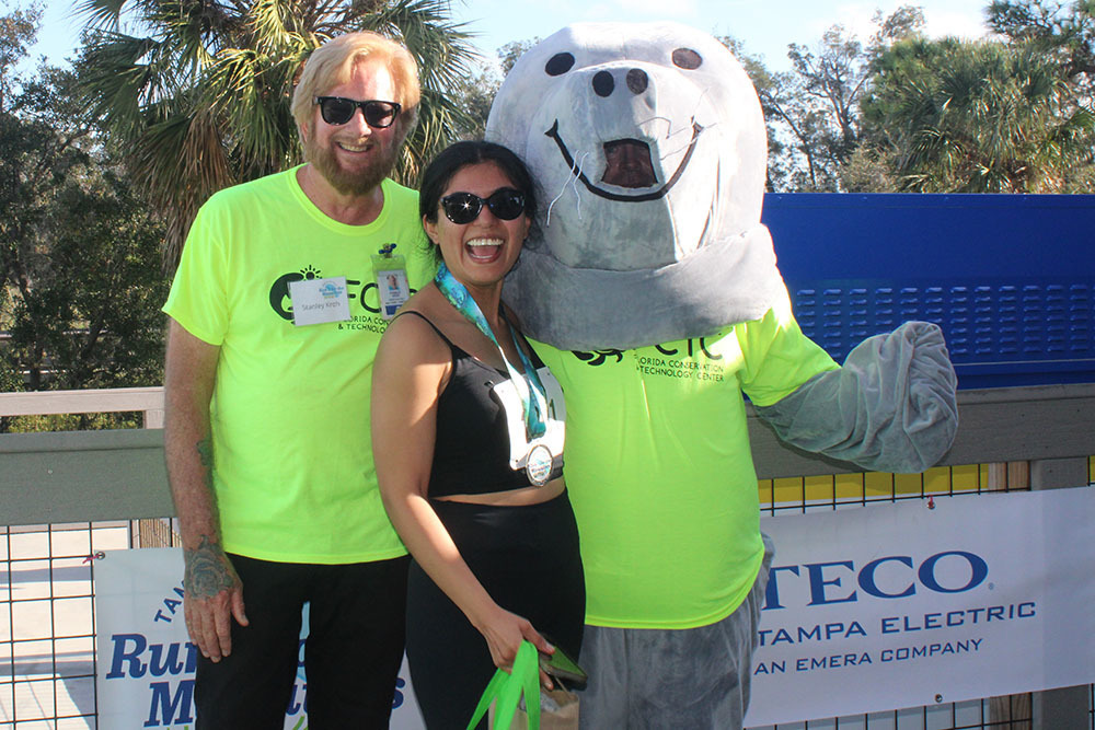 Stan Kroh, Mollie the Manatee and division winner at awards ceremony.